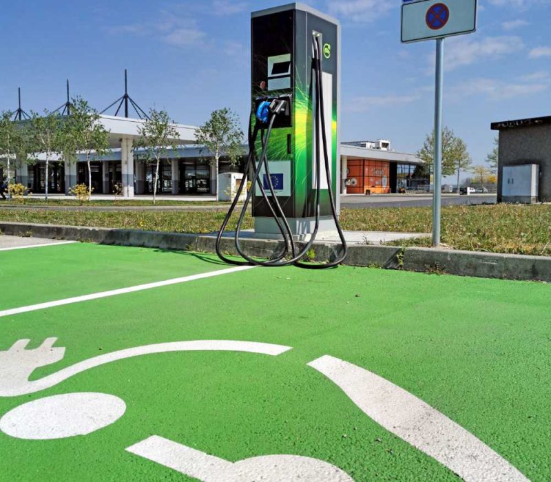 ev-charging-station-on-parking-lot-parking-space-g-FL54TNK.jpg